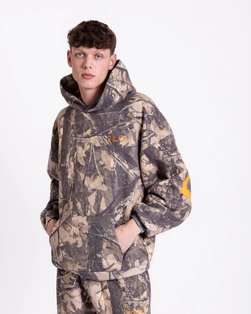 Forgiven - Dark Camo | Tyler is 6’ and wears a size M